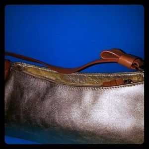 Gold and tan genuine leather leather BCBGirls bag